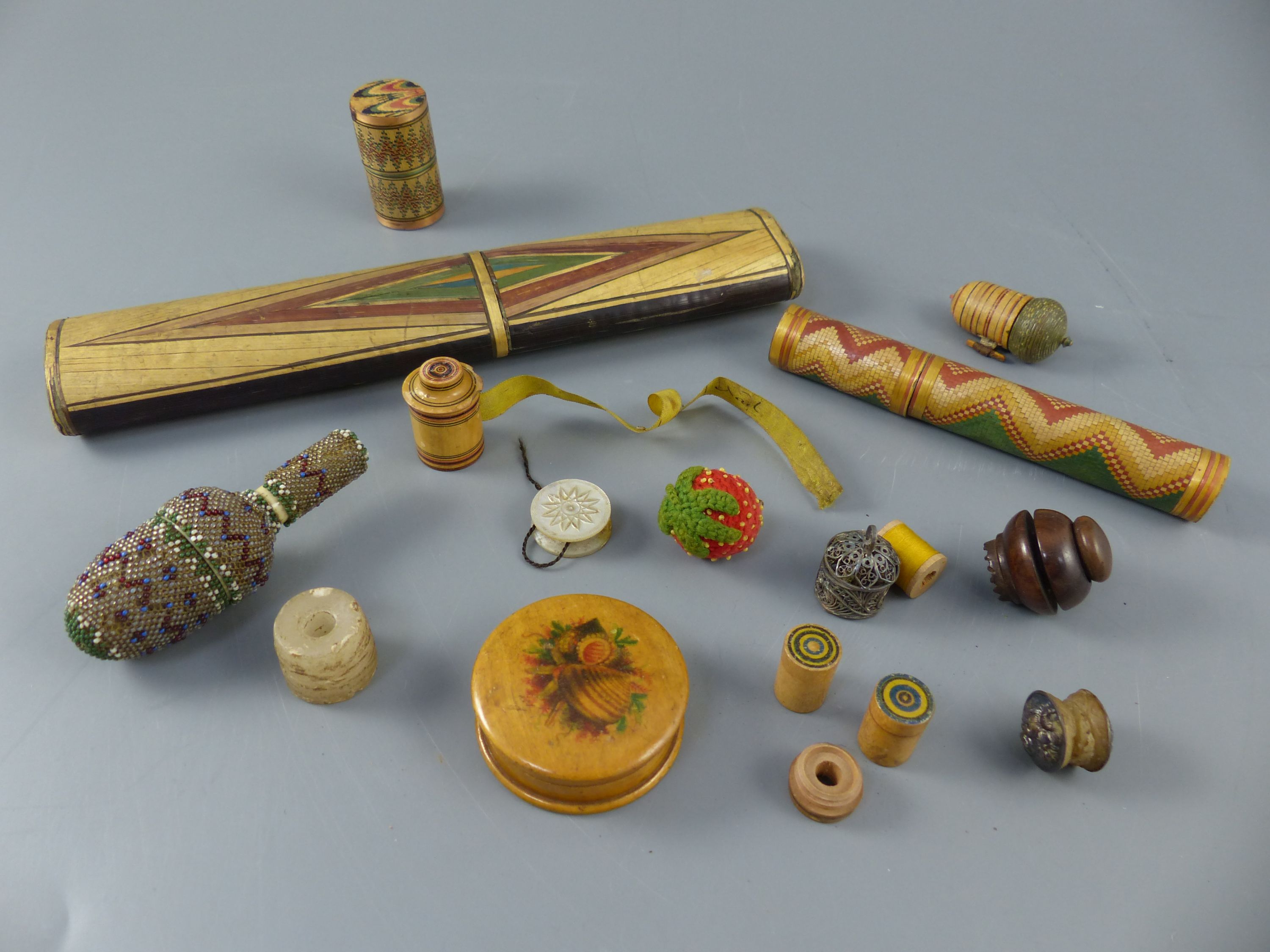 A collection of early 19th century and Victorian sewing accessories